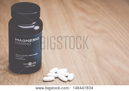 Inverigo Italy - September 9 2016: marine magnesium citrate tablets Bios Line nutritional supplement in a glass bottle