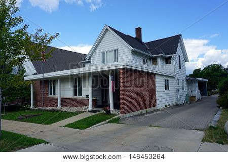 PETOSKEY, MICHIGAN / UNITED STATES - AUGUST 5, 2016: A home on Mitchell Street near downtown Petoskey.