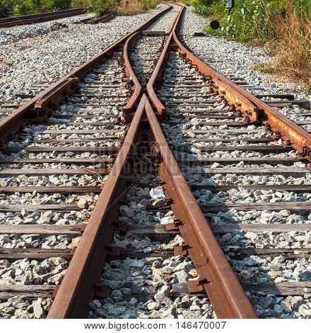 The railway junction in vertical attached to the rails railroad.