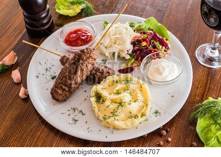 kebab with mashed potatoes