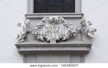 VIENNA, AUSTRIA - September 3, 2016: Detail of the church name Maria Hulf on a plate above the main entrance, on September 3, 2016 in Vienna, Austria