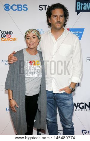 Kurt Iswarienko and Shannen Doherty at the 5th Biennial Stand Up To Cancer held at the Walt Disney Concert Hall in Los Angeles, USA on September 9, 2016.