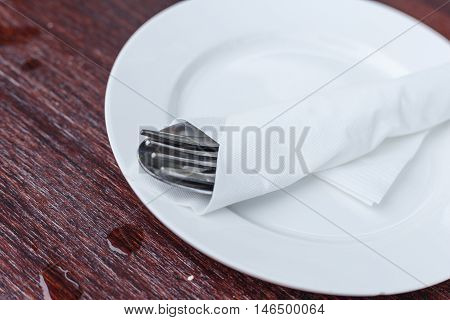 Clean dish and spoon fork ready for use