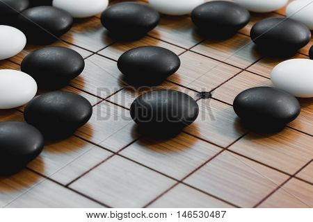 Go game or Weiqi (Chinese board game)