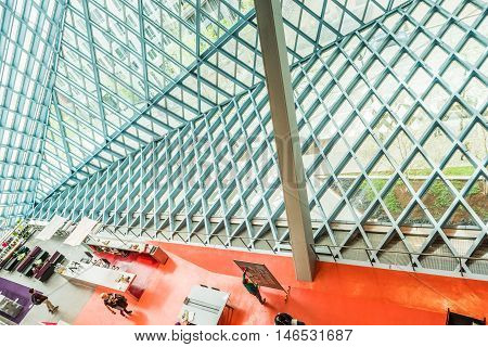 Seattle, USA - April 15, 2016: Aerial view of main floor of the public Central Library with modern glass architecture