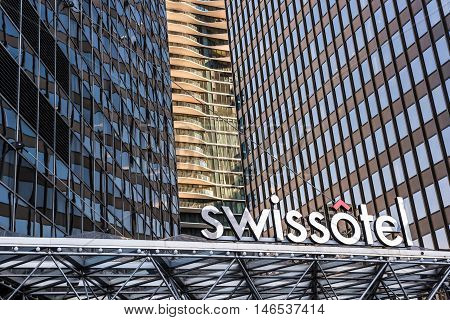 Chicago, USA - May 30, 2016: Modern urban architecture of Swissotel in downtown city with text, sign and logo and many windows