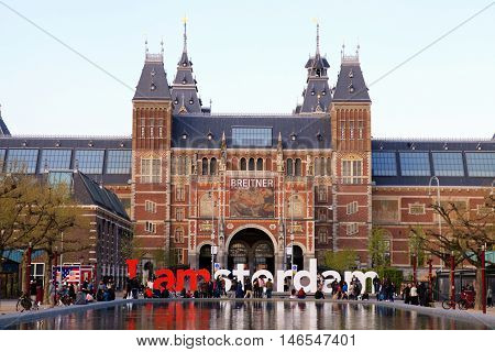 AMSTERDAM, NETHERLANDS - MAY 4, 2016: The Rijksmuseum Amsterdam museum area with pool and the words IAMSTERDAM in Amsterdam, The Netherlands.