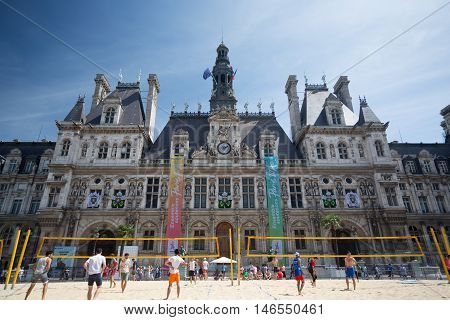 PARIS FRANCE - AUGUST 13 2016. People playing beach volley in front of the Hôtel de Ville in the centre of Paris