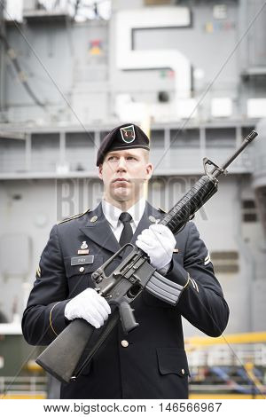 NEW YORK MAY 30 2016: Personnel from the US Army 99th Regional Support Command, Fort Dix, NJ prior to the rifle salute at the Memorial Day Observance service on the Intrepid Sea, Air & Space Museum.
