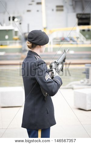 NEW YORK MAY 30 2016: Personnel from the US Army 99th Regional Support Command, Fort Dix, NJ prior to the rifle salute at the Memorial Day Observance service on the Intrepid Sea, Air & Space Museum.