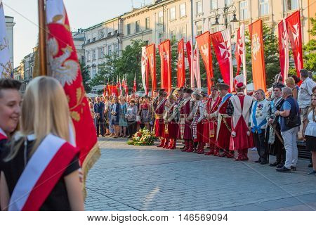 KRAKOW, POLAND - FEB 10, 2016: Unidentified participants of ceremony is the vow of first classes of the Jan III Sobieski High School (founded in 1883) at the Main Market Square near St.Mary Cathedral.