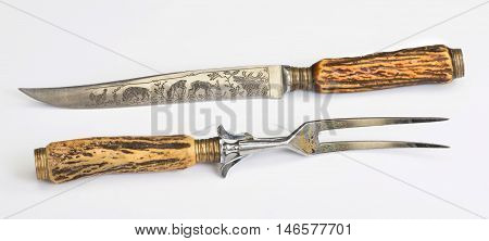 Antique stag horn carving knife and fork set.