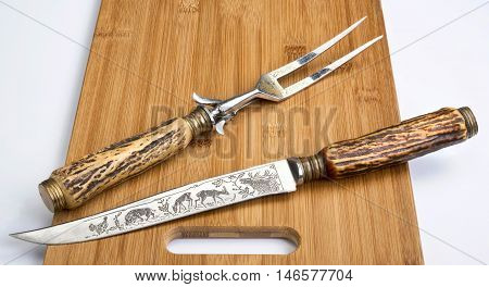 Antique stag horn carving knife and fork set.