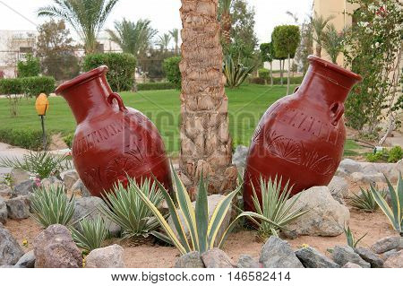 Two decorative design earthen jugs, Egypt, Hurghada