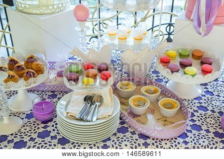 Authentic buffet, assorted fresh fruits, berries and citrus fruits. Morning atmospheric lighting, fashionable trendy spot soft focus. Preparation for design creative menu.