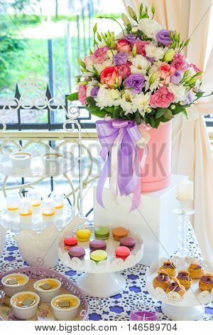 Authentic buffet, assorted fresh fruits, berries and citrus fruits. Morning atmospheric lighting, fashionable trendy spot soft focus. Preparation for design creative menu.