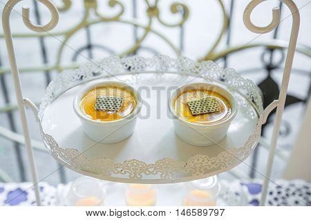 Two cups of honey candy bar yellow