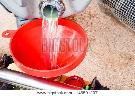 the Flowing diesel oil. Closeup.background for texture