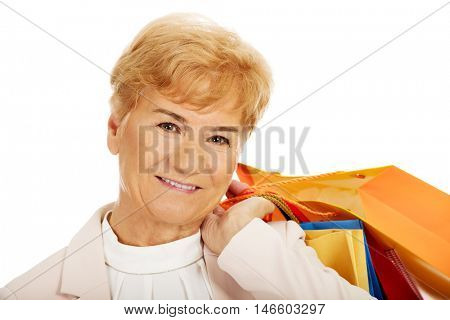 Happy business woman holging shopping bags