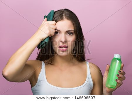 Pretty Woman With A Skin Care Product