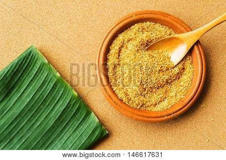 White sesame seeds in earthenware banana leaf cork wood texture background one of the ingredients of Asia food and sweet dessert