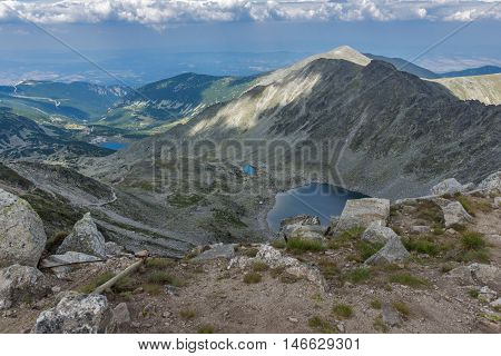Dark clouds over Ledenoto (Ice) Lake, Landscape from Musala Peak, Rila mountain, Bulgaria