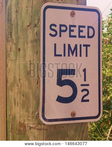 Speed limit sign along a road in Belize