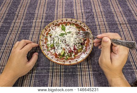 Eating Traditional Shopska Salad