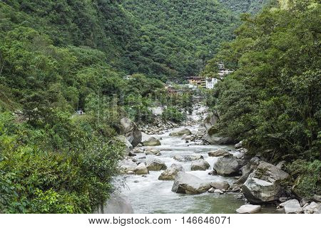 The Railroad Track Crossing Jungle And Urubamba River, Connecting Machu Picchu Village To Hydroelect