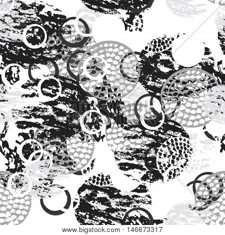 Black and white grunge abstract seamless pattern with circles, rings, different brush strokes and shapes. Infinity textured circles background. Vector illustration.