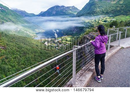 Geiranger fjord, Beautiful Nature Norway panorama. It is a 15-kilometre (9.3 mi) long branch off of the Sunnylvsfjorden, which is a branch off of the Storfjorden (Great Fjord).