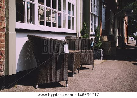Beaconsfield, England - June 2016: Chairs For Sale Outside A Shop In The Old Town Vintage Retro Filt