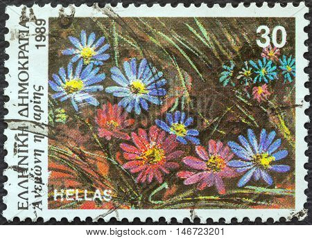 GREECE - CIRCA 1989: A stamp printed in Greece from the "Wild Flowers" issue shows Anemone blanda (Grecian Windflower), circa 1989.