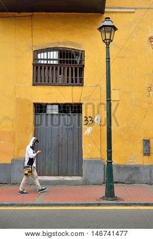 LIMA PERU - August 23 2016: Unidentified people in street of Lima Peru on August 23 2016. Lima is capital city of Peru South America.