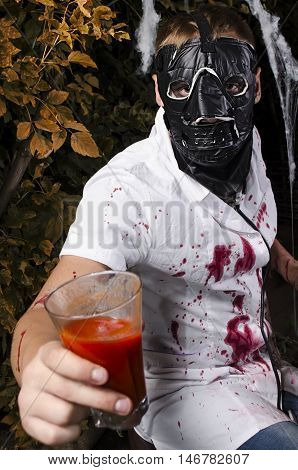 the guy in a suit for Halloween at night on the street