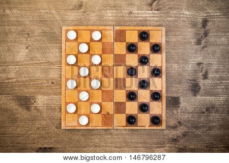 Top view of draughts checkers board game
