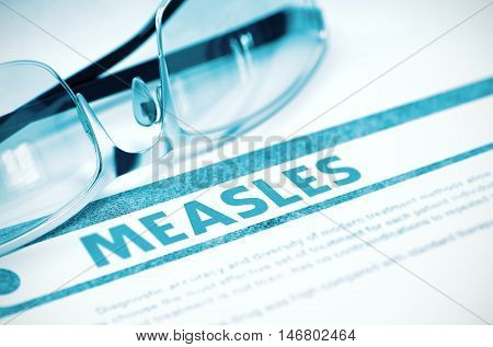 Diagnosis - Measles. Medicine Concept on Blue Background with Blurred Text and Pair of Spectacles. Selective Focus. 3D Rendering.