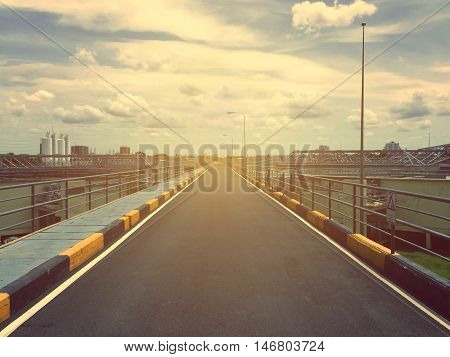 vintage empty road in the factory with vintage tone