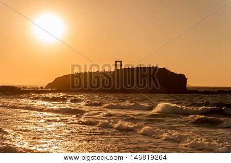 Portara of Naxos famous landmark of greece at sunset