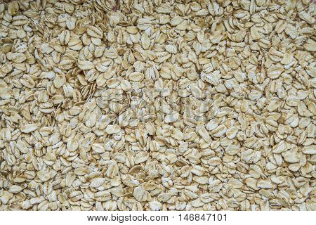 oatmeal sprinkled on the table, background oatmeal