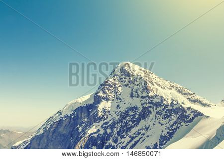Swiss Alps mountain landscape Jungfraujoch Switzerland vintage effect
