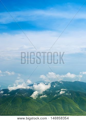 Landscape with clouds mountains and blue sky. Carpathians Ukraine.