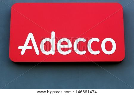 Fredericia, Denmark - September 10, 2016: Adecco logo on a wall. Adecco Group, based near Zurich, Switzerland, is the largest staffing firm in the world