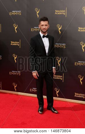 LOS ANGELES - SEP 11:  Travis Wall at the 2016 Primetime Creative Emmy Awards - Day 2 - Arrivals at the Microsoft Theater on September 11, 2016 in Los Angeles, CA