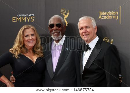 LOS ANGELES - SEP 11:  Lori McCreary, Morgan Freeman, James Younger at the 2016 Primetime Creative Emmy Awards - Day 2 - Arrivals at the Microsoft Theater on September 11, 2016 in Los Angeles, CA