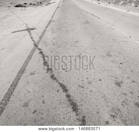 In Oman Asphalt Street White Line And Mountain Panorama
