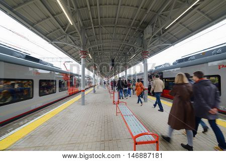 Passengers On The Platform Of The Railway Station