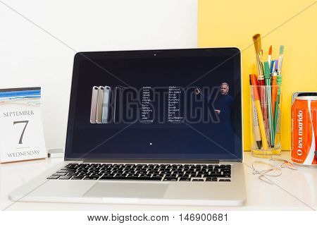 PARIS FRANCE - SEP 8 2016: Apple Computers website on MacBook Retina in room environment showcasing live coverage of Apple Keynote - availability of the new iphone dates in the apple store