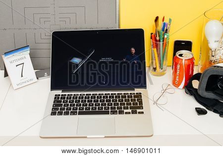 PARIS FRANCE - SEP 8 2016: Apple Computers website on MacBook Retina in room environment showcasing live coverage of Apple Keynote - performance of the new A10 Fusion chip gpu cpu performance