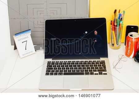 PARIS FRANCE - SEP 8 2016: Apple Computers website on MacBook Retina in room environment showcasing live coverage of Apple Keynote - performance of the new A10 Fusion chip gpu cpu performance